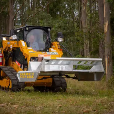 Elgra Engineering: two blade slasher attached to a front loader in a forest