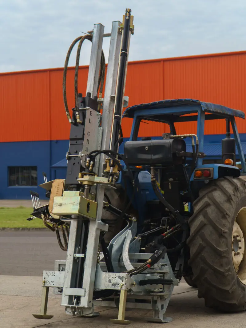 Elgra fence post driver - series 89 swing shift attachment on tractor