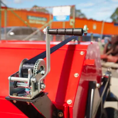 Elgra Engineering: A close up of the hand winch of an orange paddock Cleaner