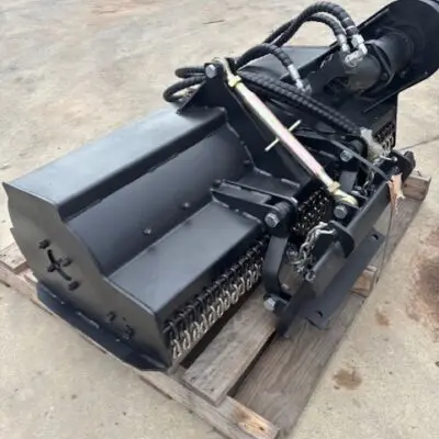 Elgra Engineering: A side profile image of a Flail Mower on a crate