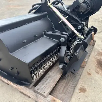 Elgra Engineering: A back side profile image of a Flail Mower on a crate