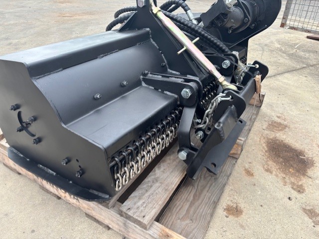 Elgra Engineering: A side profile image of a Flail Mower on a crate